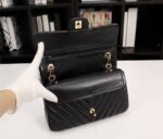 chanel black chevron medium flap bag 25cm nysfl.jpeg