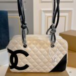 chanel cambon bowler bag quilted leather white and black 26cm ozqjr.jpg