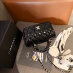 chanel classic mini bag in shiny leather with handle black 20cm mpurv.jpg