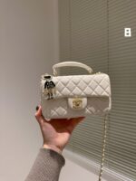 chanel mini flap bag with top handle lion charm white 21cm vb4jd.jpg