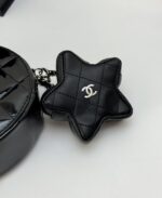 chanel round with charm and star coin purse black 15cm p7rsf.jpg