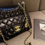 chanel small hobo bag in shiny leather gold black 24cm ndvwx.jpg