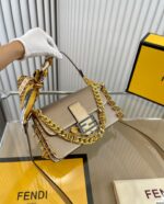fendi x versace baguette fendace bag in gold perforated leather 25cm nrfox.jpg