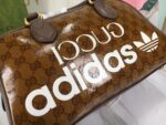 gucci x adidas mini duffle bag brown 315cm 702397 uvsft 7268 wddbh.jpeg