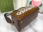 gucci x adidas mini duffle bag brown 315cm 702397 uvsft 7268 zishj.jpeg