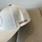 hermes baseball cap white h logo hflty.jpg
