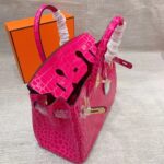 hermes birkin 30 crocodile gold toned hardware dark pink 7hdqk.jpeg