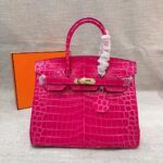 hermes birkin 30 crocodile gold toned hardware dark pink iug4d.jpeg