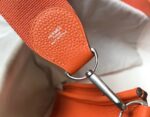 hermes clemence evelyne pm 25cm orange feu hyarw.jpeg