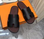 hermes izmir sandal black and brown x4atn.jpg