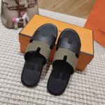 hermes izmir sandal kaki and noir h231812zhk3400 0spby.jpg