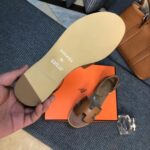 hermes santorini sandal brown navth.jpg