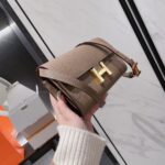 herms constance to go epsom etoupe 21cm l5bdm.jpg