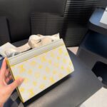louis vuitton gaston wearable wallet monogram yellow 22cm m14690 1ecz1.jpg