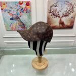louis vuitton monogram coated canvas cap brown q6r3m.jpg