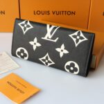 louis vuitton sarah wallet bicolor monogram empreinte black and beige 19cm m80496 mynme.jpg