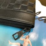 louis vuitton voyage pochette damier infini leather black 33cm 2iifk.jpeg