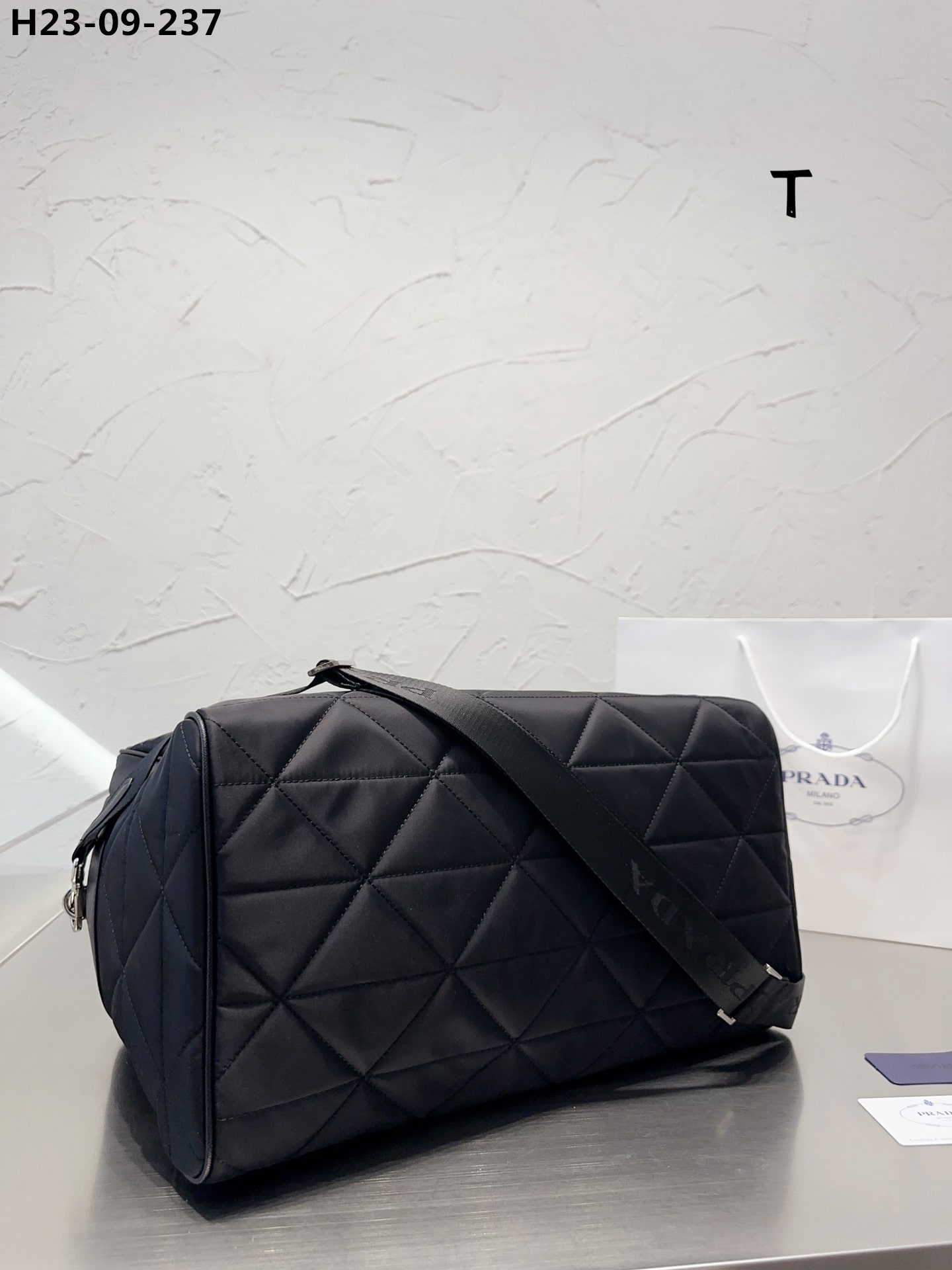 prada quilted re nylon travel bag black 43cm 2va0092dgwf0002vooo 0vyeu.jpg