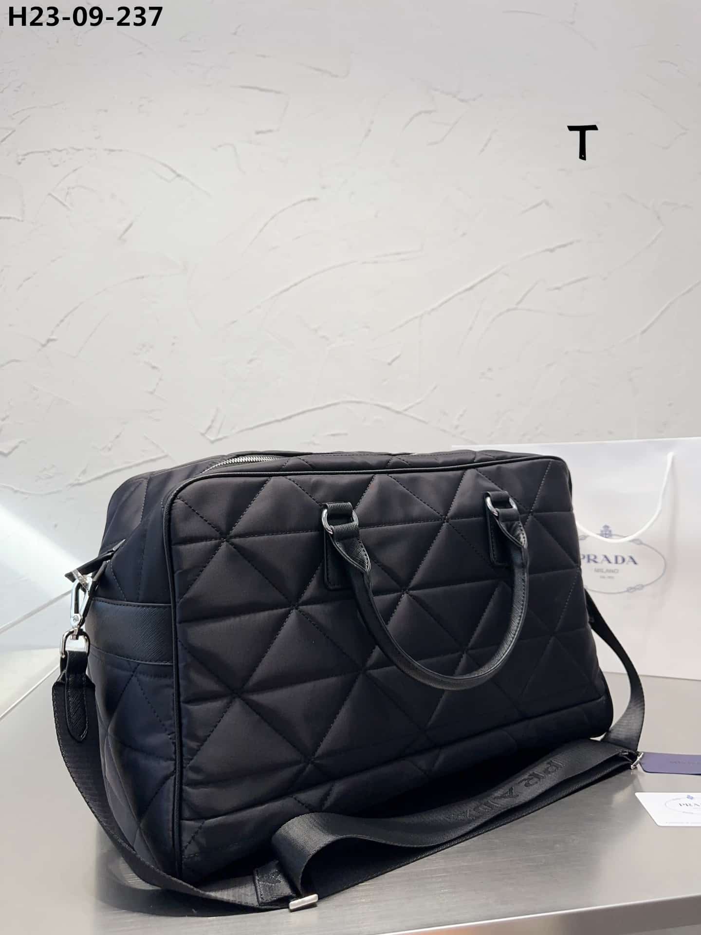 prada quilted re nylon travel bag black 43cm 2va0092dgwf0002vooo 3etlv.jpg
