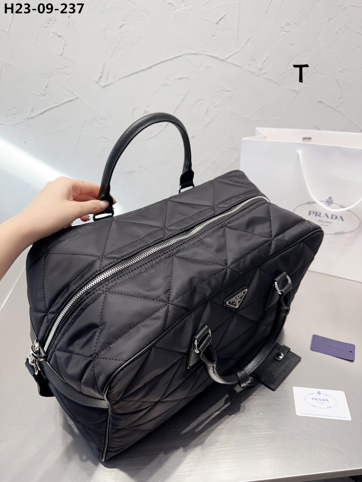 prada quilted re nylon travel bag black 43cm 2va0092dgwf0002vooo h9sjp.jpg