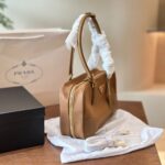 prada re edition 1978 medium cork beige 30cm 1bb115 r064 f0594 v ooo z12v9.jpg