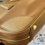 prada re edition 1978 medium cork beige 30cm 1bb115 r064 f0594 v ooo zlaht.jpg