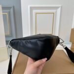 prada triangle shoulder bag black 27cm icaud.jpg