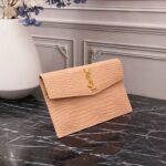 saint laurent embossed monogram uptown pouch beige 27cm ayhp5.jpg