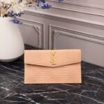saint laurent embossed monogram uptown pouch beige 27cm mzjrz.jpg