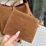 saint laurent le 5 7 supple in suede golden brown 24cm w7z9t.jpg