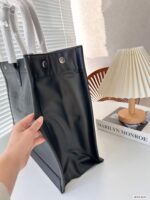 saint laurent rive gauche large tote bag in glazed leather black 48cm 587273aacp21000 c2boz.jpg