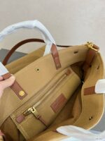 saint laurent universite north south foldable tote bag in canvas and smooth leather dark beige 40cm 5vqfa.jpg
