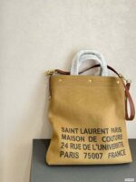 saint laurent universite north south foldable tote bag in canvas and smooth leather dark beige 40cm sf9q2.jpg