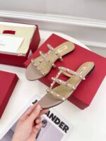 valentino garavani rockstud flat slide sandal pink 5w2s0c49vod p45 78ue1.jpg