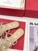 valentino garavani rockstud flat slide sandal pink 5w2s0c49vod p45 o5r47.jpg