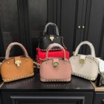 valentino garavani rockstud handbag in grainy leather black 21cm e3bdk.jpg