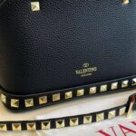 valentino garavani rockstud handbag in grainy leather black 21cm quuup.jpg