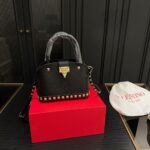 valentino garavani rockstud handbag in grainy leather black 21cm z8hgo.jpg