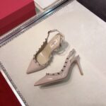 valentino garavani rockstud patent leather strap pump beige nadx6.jpg