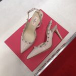 valentino garavani rockstud patent leather strap pump beige pknjb.jpg