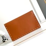 valentino garavani rockstud raffia clutch bag in brown 28cm bydr2.jpg