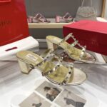 valentino garavani rockstud slide sandal in laminated nappa gold 6w2s0c47qkh i8m 7sdog.jpg
