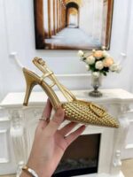 valentino garavani vlogo woven leather slingback pumps gold kligs.jpg