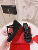 valentino rockstud wedge in black ihfee.jpeg