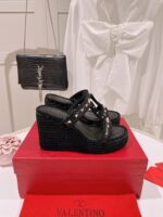 valentino rockstud wedge in black sgmho.jpeg