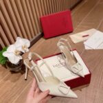 valentino vlogo signature patent leather slingback pump white vy6iv.jpeg