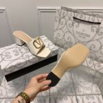 valentino vlogo signature square toe middle heel white slide sandal ooik7.jpg