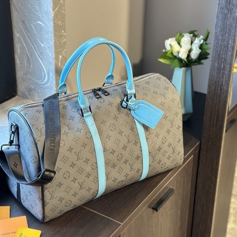 louis vuitton keepall bandoulire 45 monogram eclipse reverse coated canvas turquoise 45cm m11481 xcnps.jpg