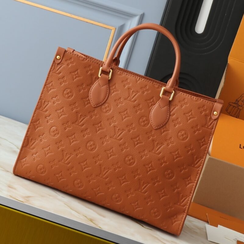 louis vuitton on the go mm monogram empreinte leather cognac 35cm m12775 6rs2t.jpg
