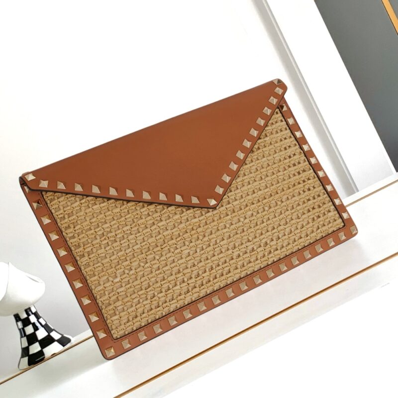 valentino garavani rockstud raffia clutch bag in brown 28cm zn4ka.jpg